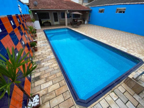 Casa com Piscina e Churrasqueira